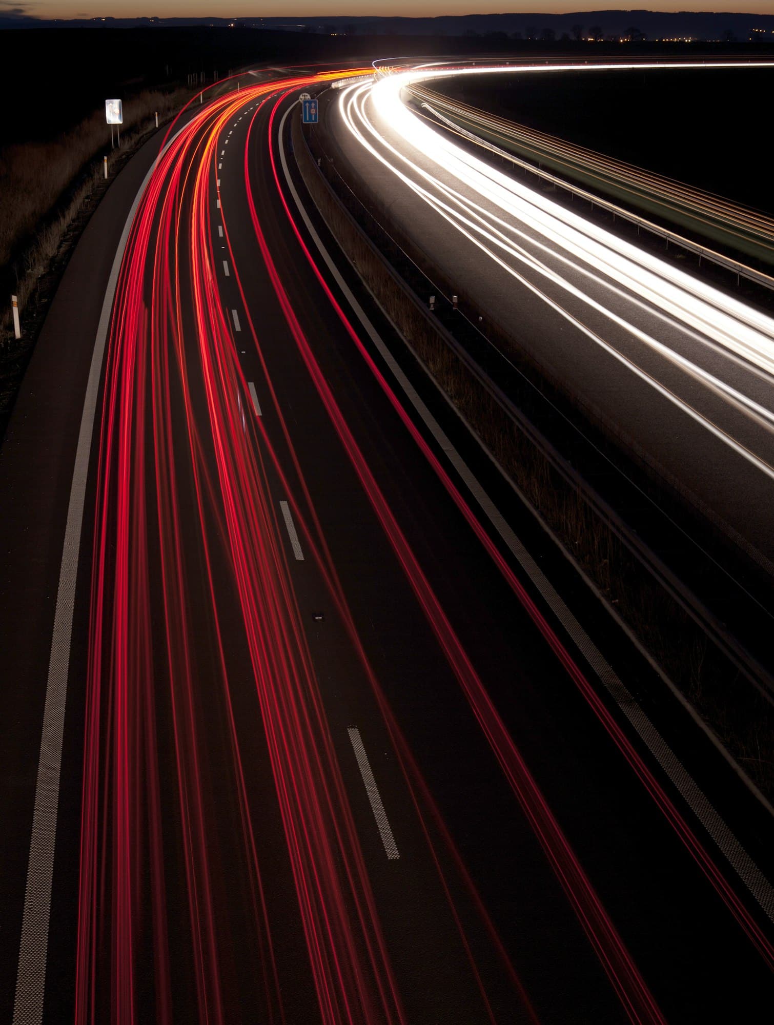 Cars moving fast on a highway